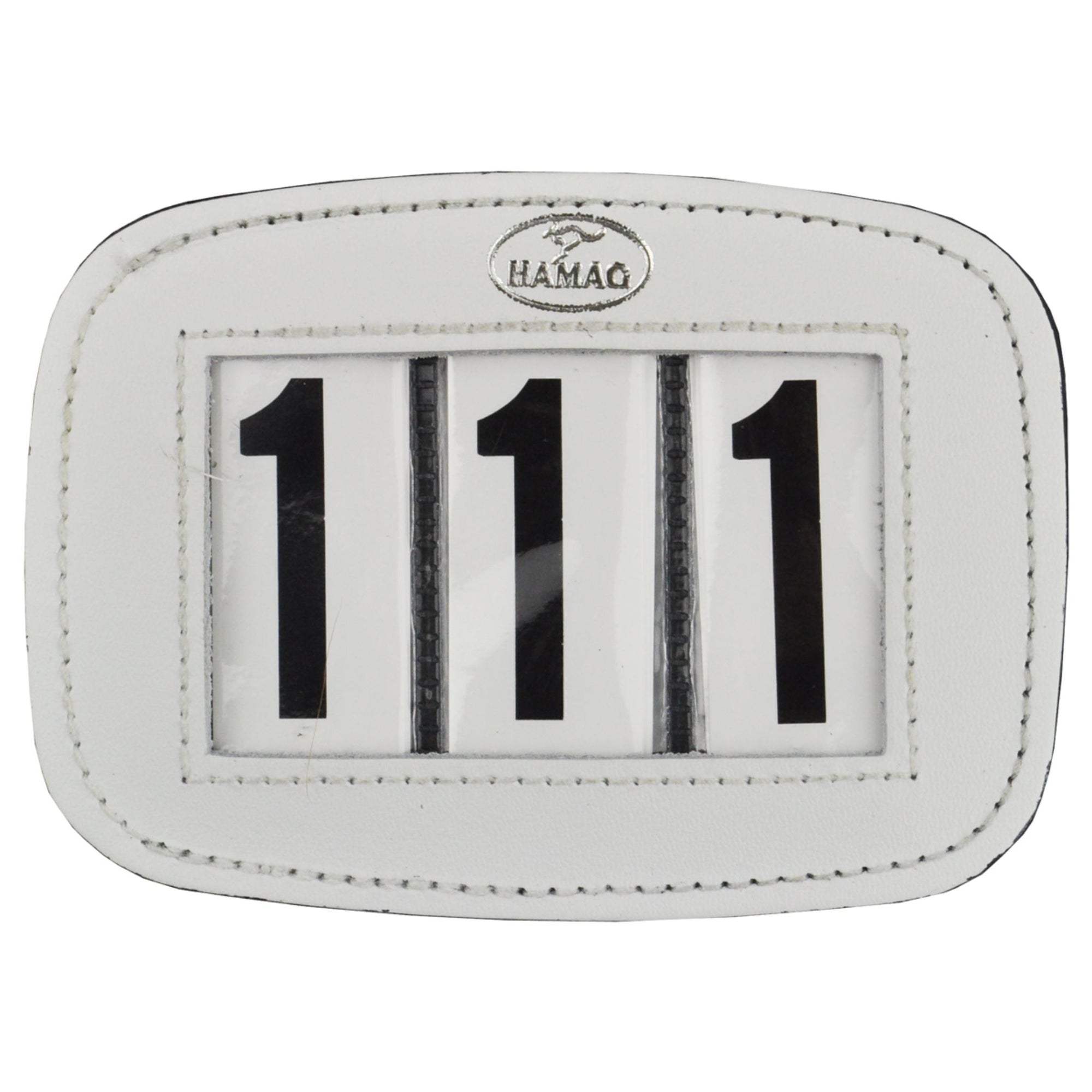 White number holder with a brass pin on back to pin on a saddle pad