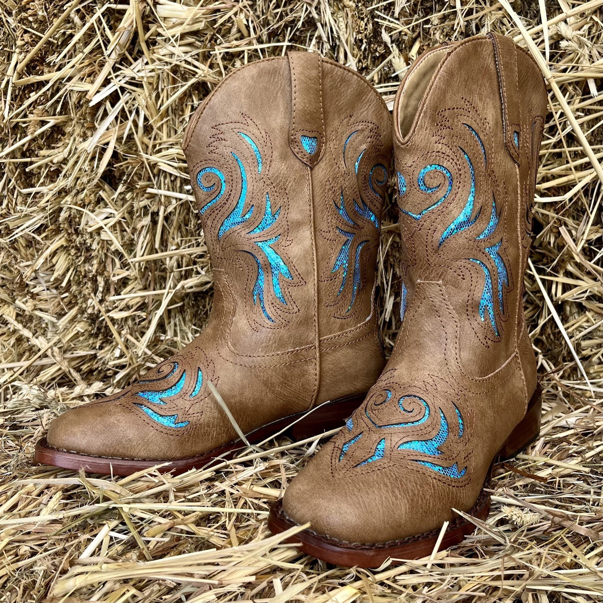 Brown boots with blue glitter swirls