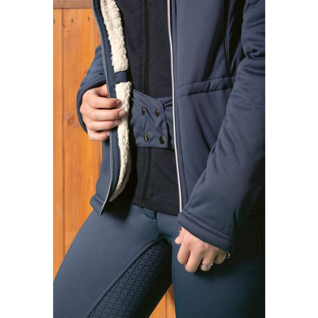 Open jacket revealing wind stopper with four black button in square pattern.