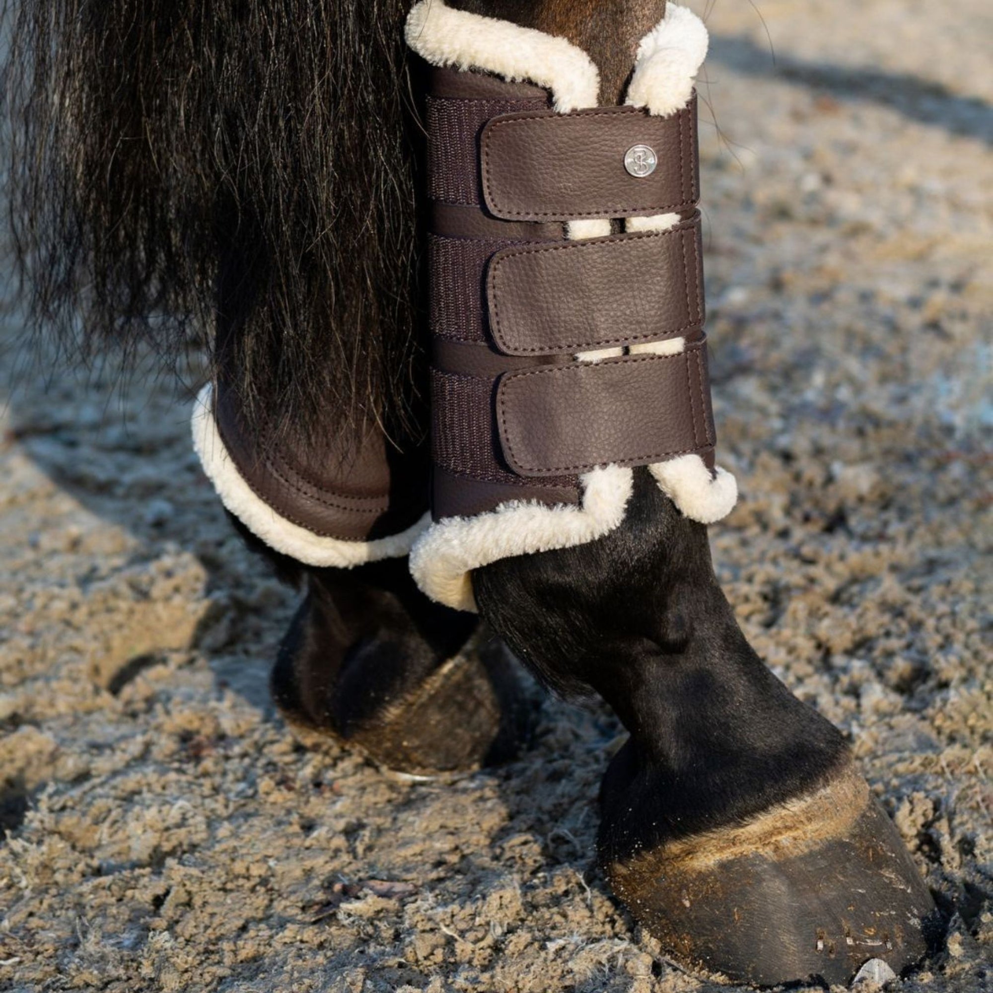 Brown fluffy brushing boot
