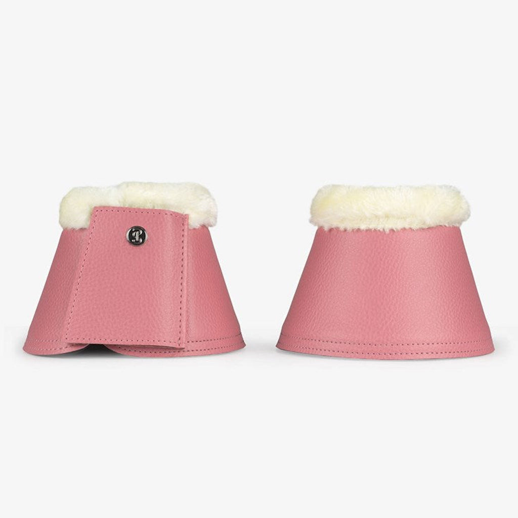 pink bell boots with white fluff