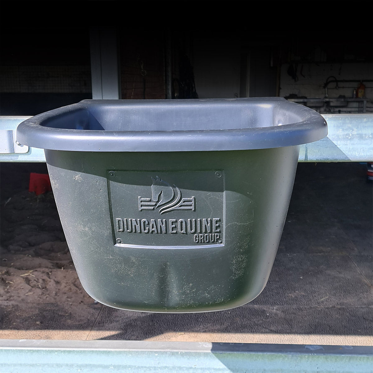 Black Stable feed tub mounted on rail