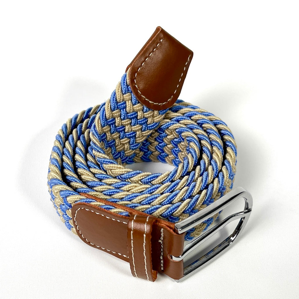 Cream and blue elastic belt with silver buckle and brown leather ends.