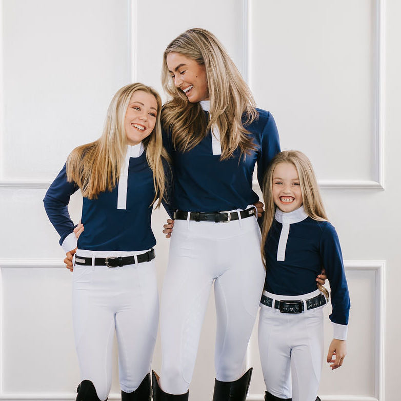 lady wearing Navy Show shirt with white collar and cuffs