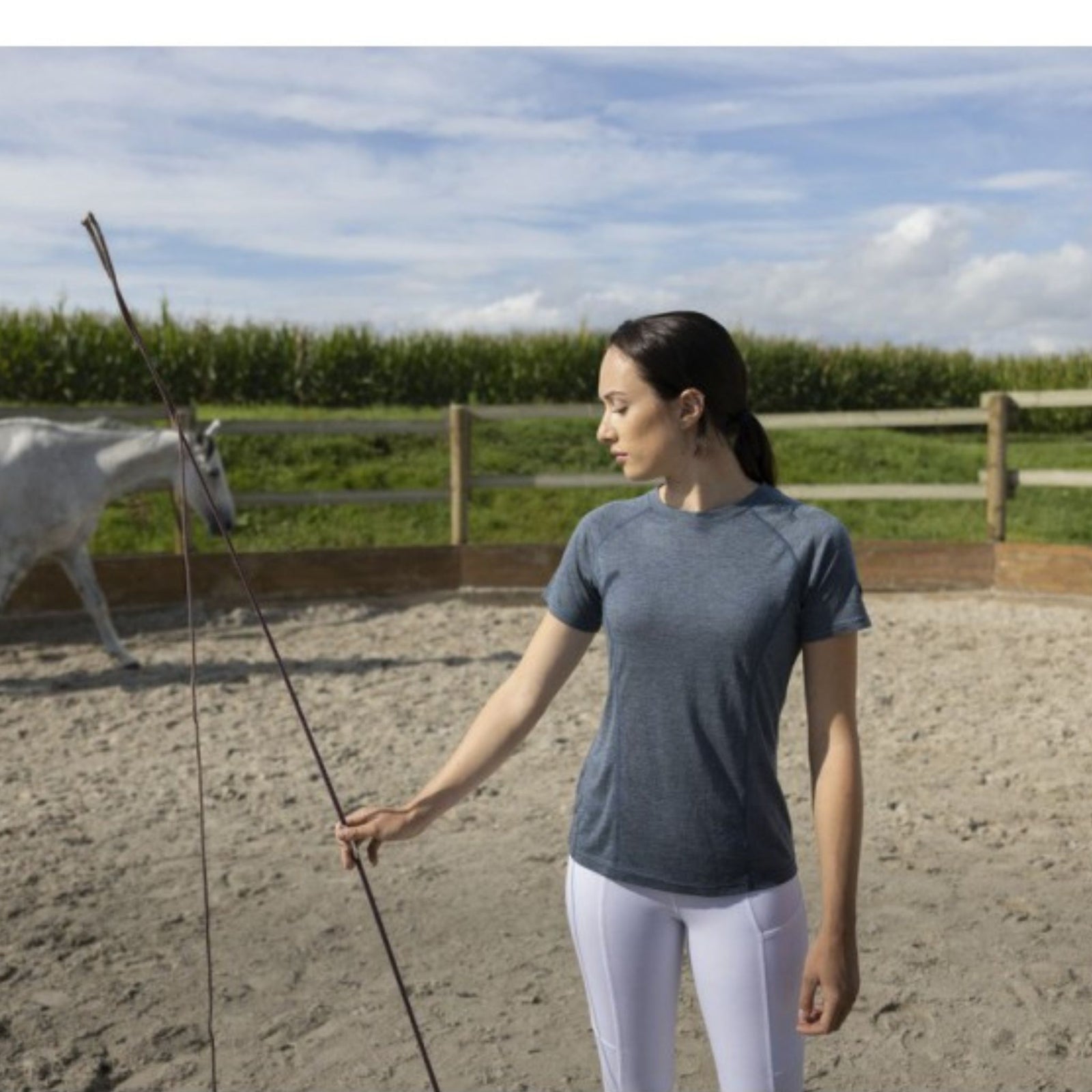 Grey top on girl with dark brown hair