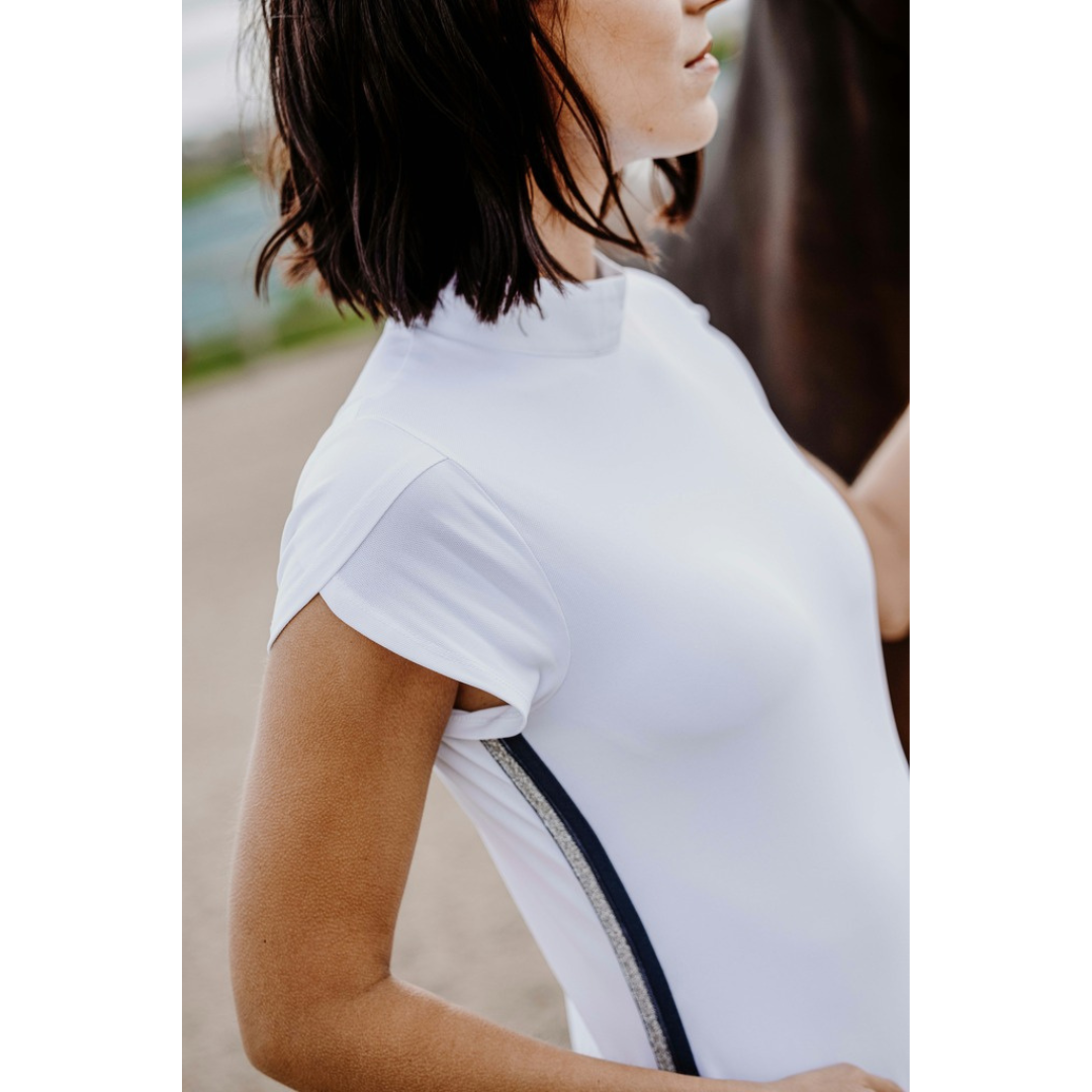 white horse riding top with tulip sleeves and stripes down the side seam.