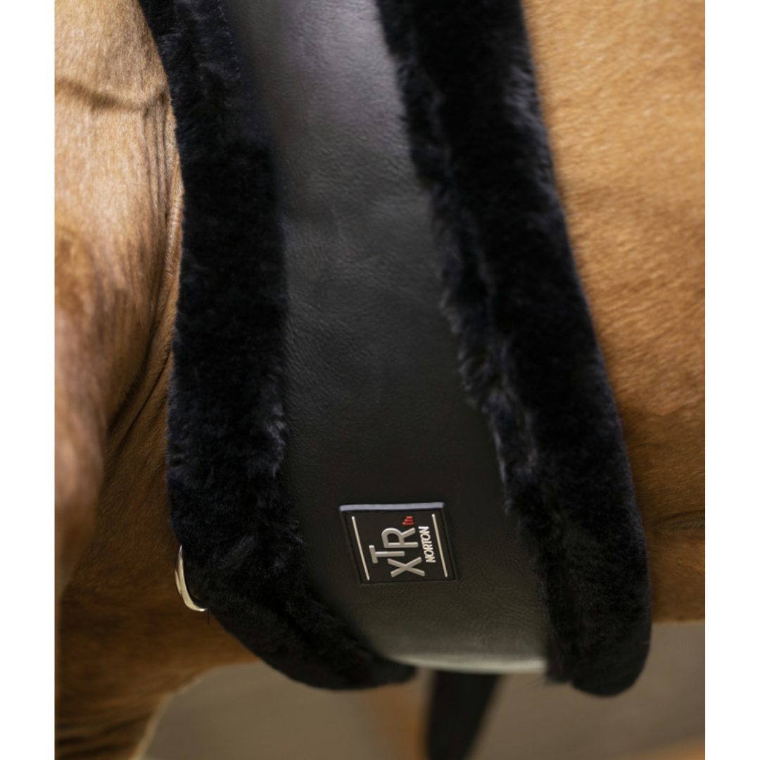 black shaped horse girth with sheepskin