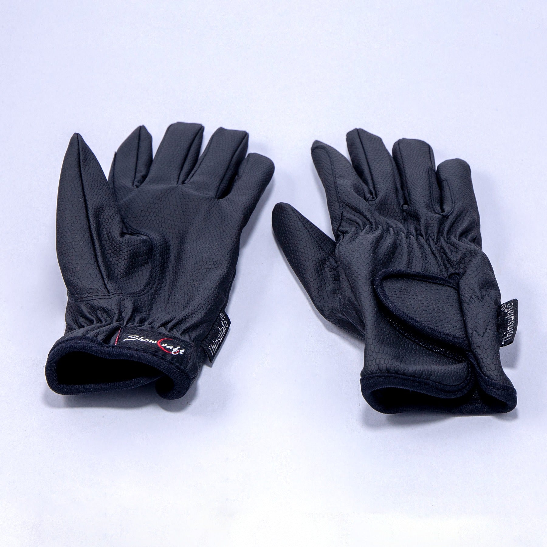 Black gloves with showcraft tag