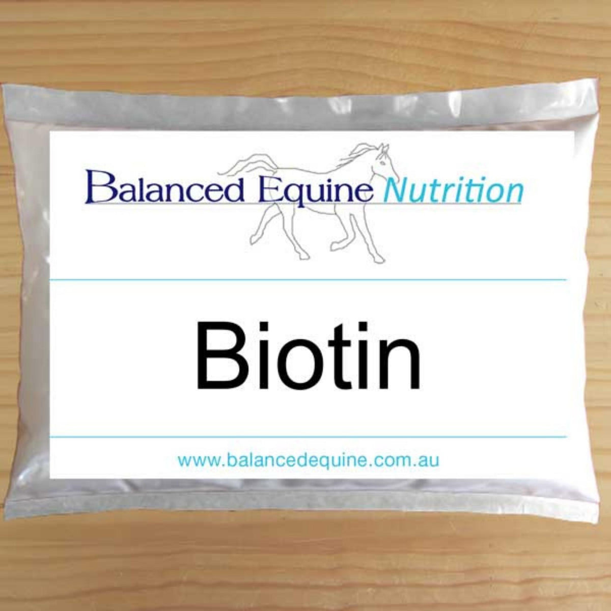 Packet of Biotin, with label stating &quot;Balanced Equine Nutrition - Biotin&quot;.