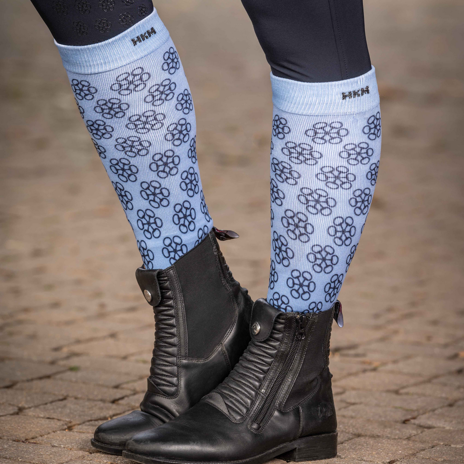 light blue and dark blue socks with bit pattern