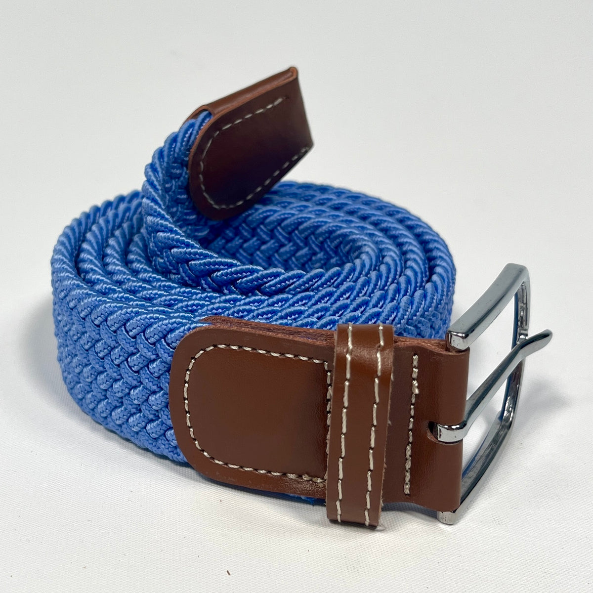 Periwinkle blue elastic belt with silver buckle and brown leather ends.
