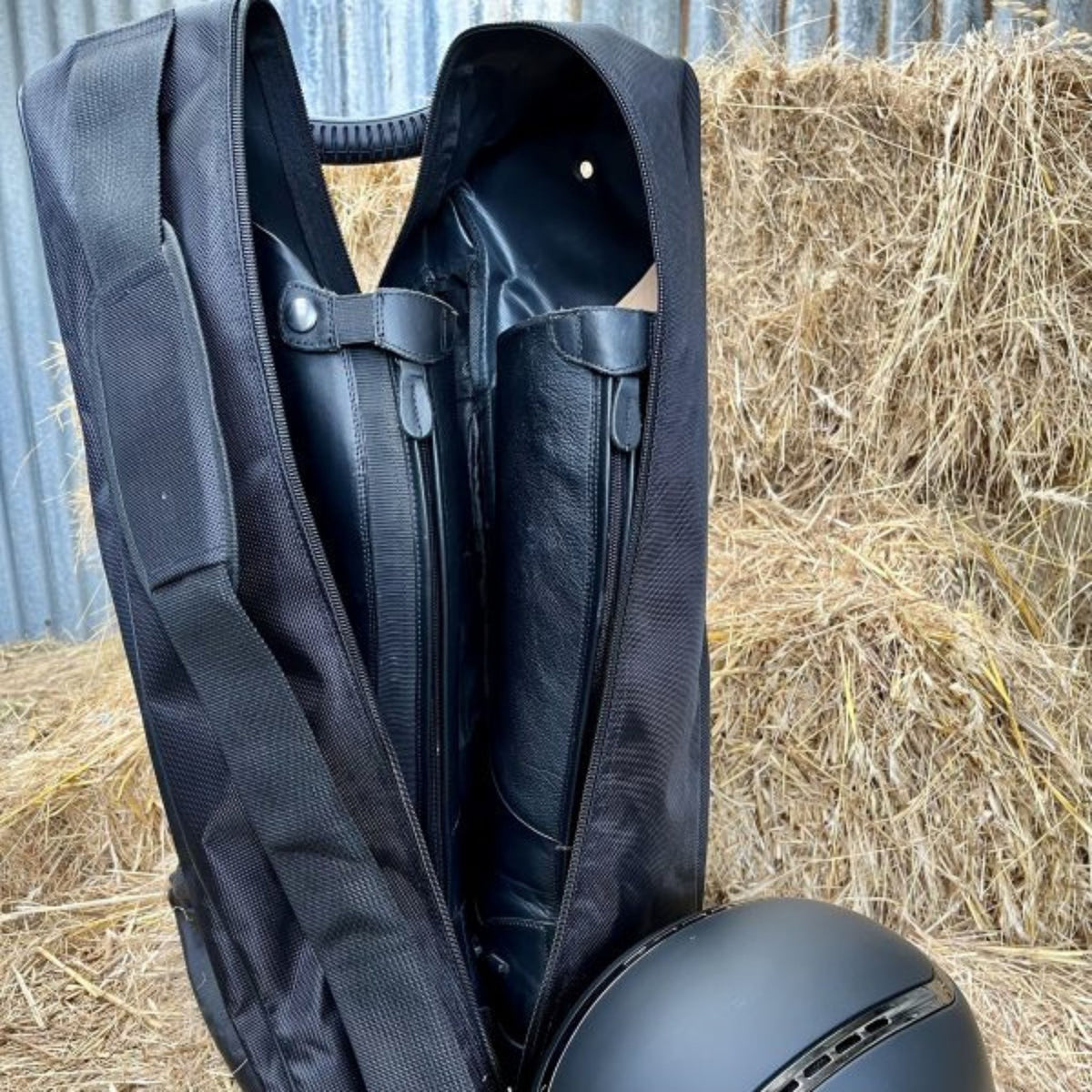 Tall boots in a black bag