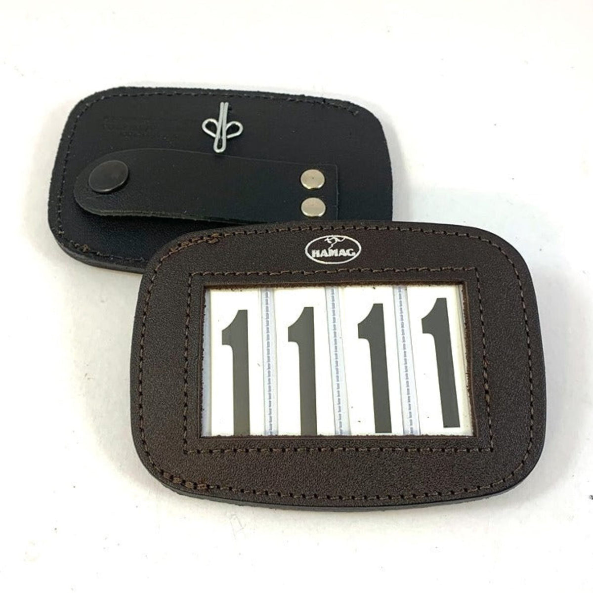 Brown Leather Number holder with Hamag logo above number slots.