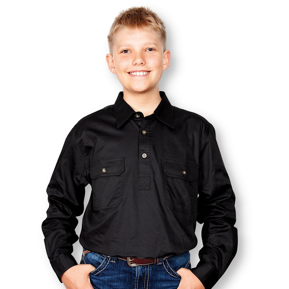 Boy wearing black shirt with collar, buttons at top and pockets.
