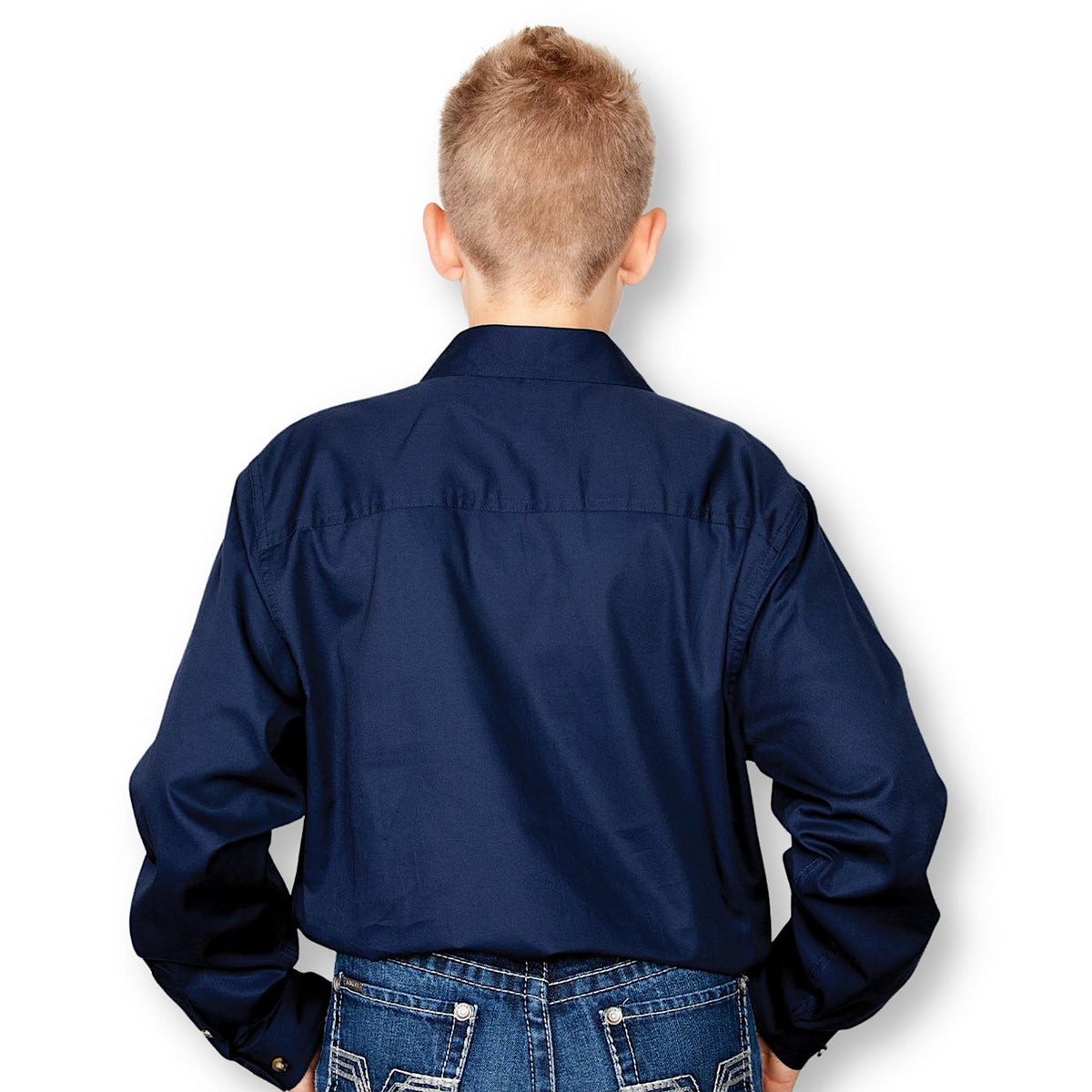 Back of boy wearing a navy long sleeve shirt with a collar.