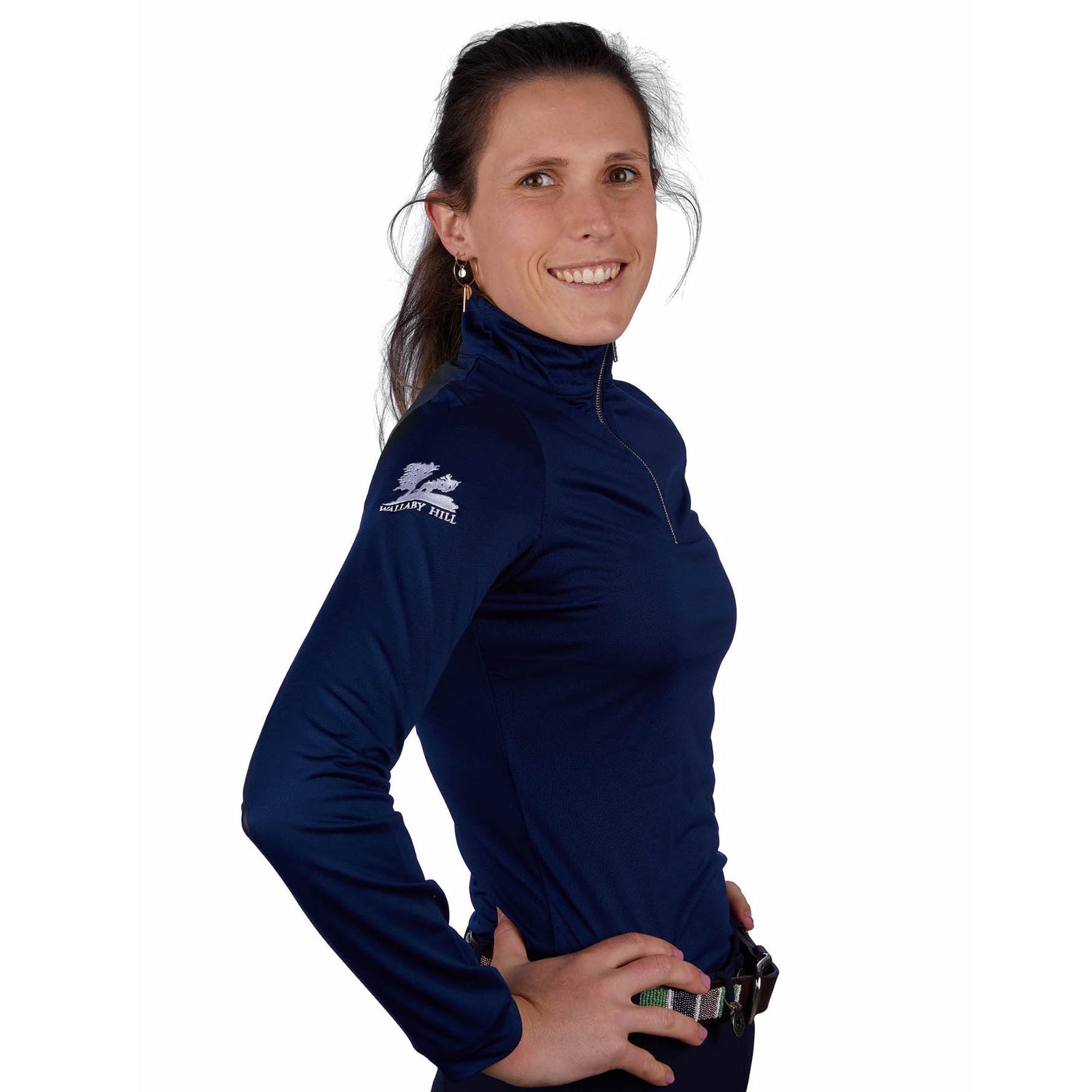 Grey top with mesh under arms and silver zip on a lady