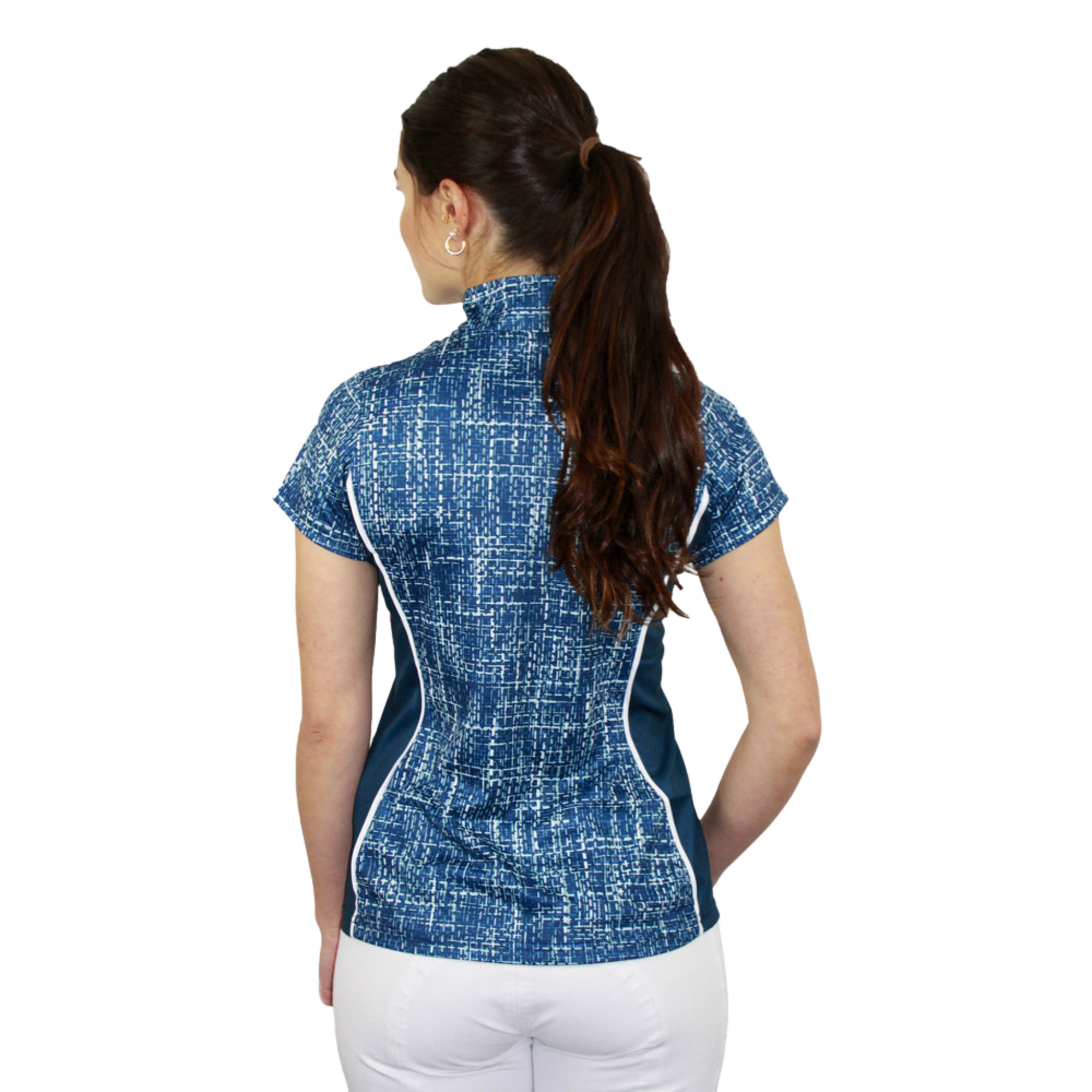 lady wearing blue and white short sleeve equestrian top