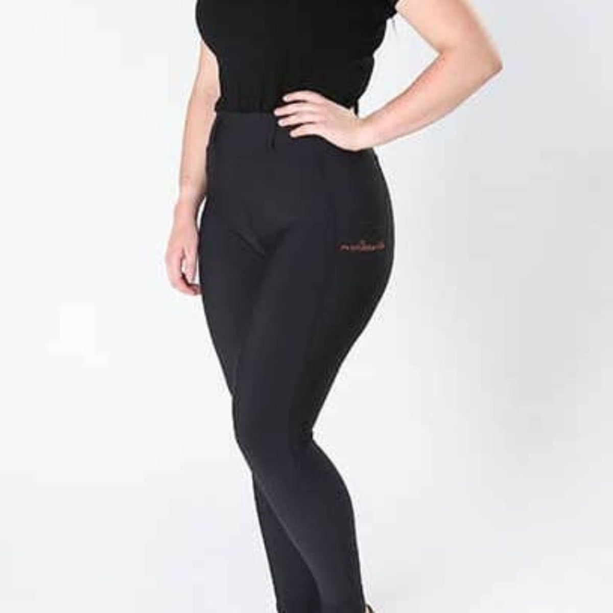 Side view of black riding tights with Performa Ride logo on pocket.